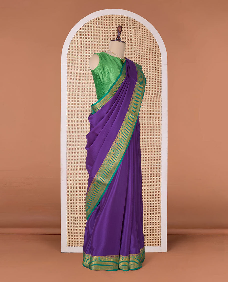 Violet plain Mysore silk saree, contrast traditional zari border of Peacock chakram, and pallu steeped with traditional zari designs