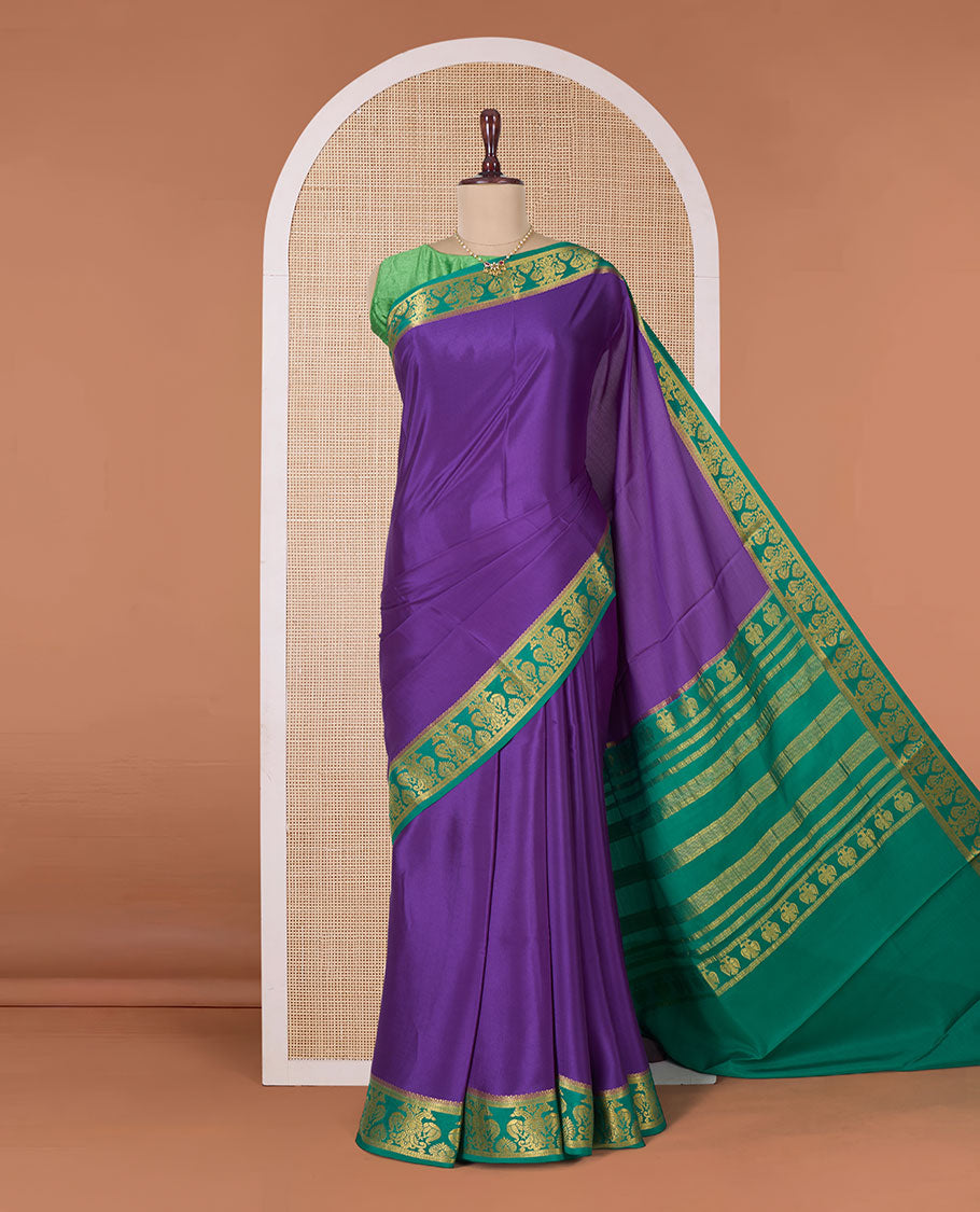 Purple plain Mysore silk saree, contrast two-headed eagle border, and pallu of traditional designs