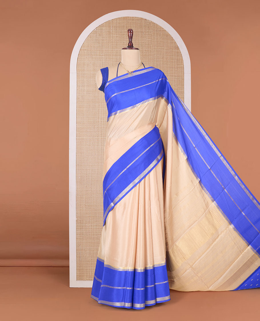 Sandal plain Mysore silk saree, contrast rettai pettu traditional zari border, and pallu of zari sparsely woven stripes