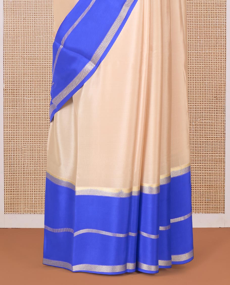 Sandal plain Mysore silk saree, contrast rettai pettu traditional zari border, and pallu of zari sparsely woven stripes