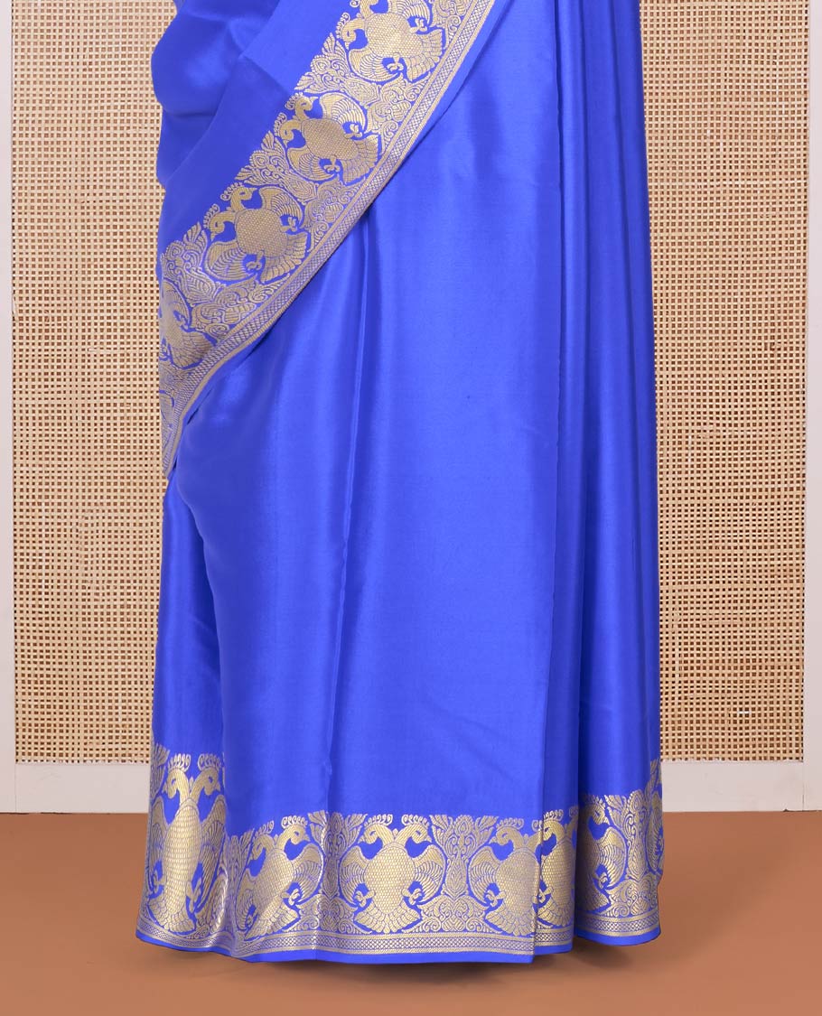 Royal blue plain Mysore silk saree, two-headed eagle border, and pallu of traditional designs