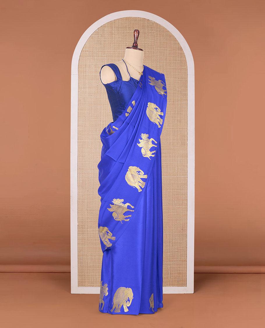 Blue plain Mysore silk saree with self-border of big elephant and horse motifs in zari, and pallu of miniatures of elephant and horse motifs
