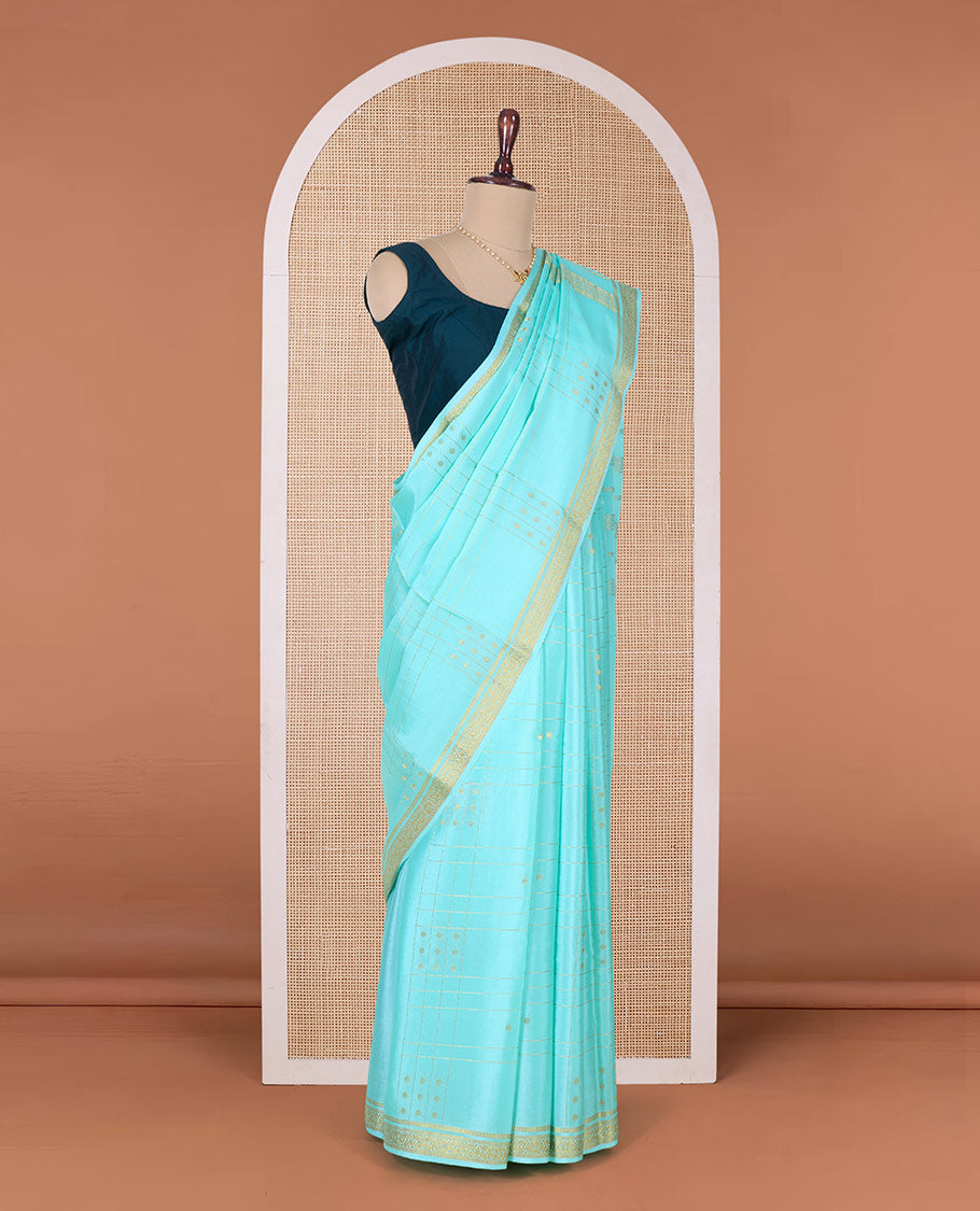 Green zari buttas, and checked Mysore silk saree, zari border, and pallu of zari stripes