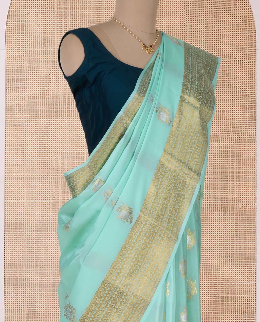 Pale green zari floral motifs woven Mysore silk saree, traditional motifs border, and pallu of intricate designs
