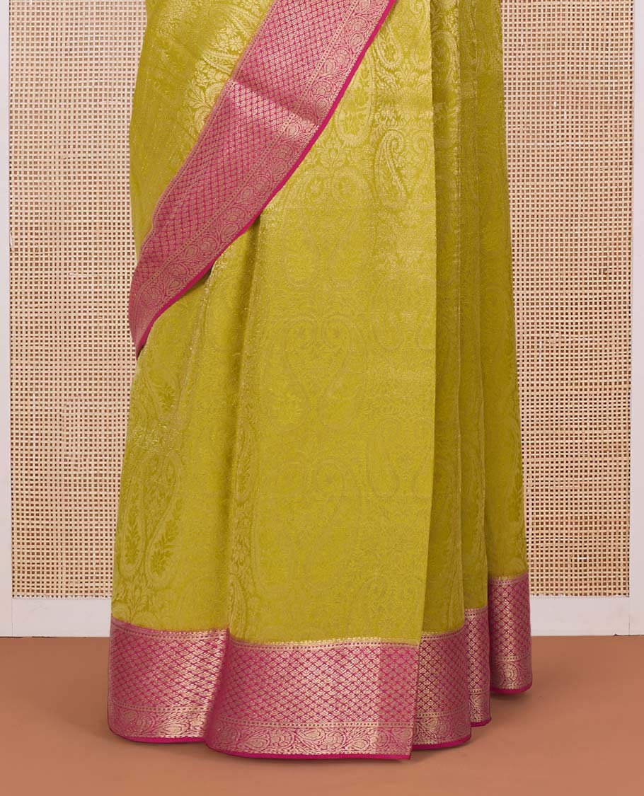 Yellow paisley jacquard Mysore silk saree, contrast traditional zari border, and pallu of floral jaal design