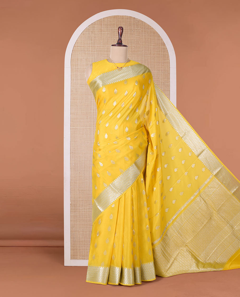 Yellow zari buttas Mysore silk saree, traditional zari jaal border, and zari elevated jaal pallu