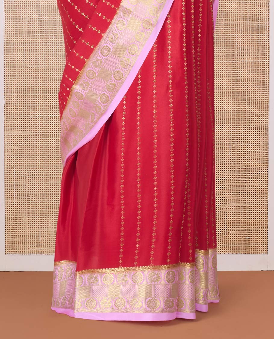 Red zari buttas Mysore silk saree, contrast peacock chakra motifs border, and traditional zari design pallu