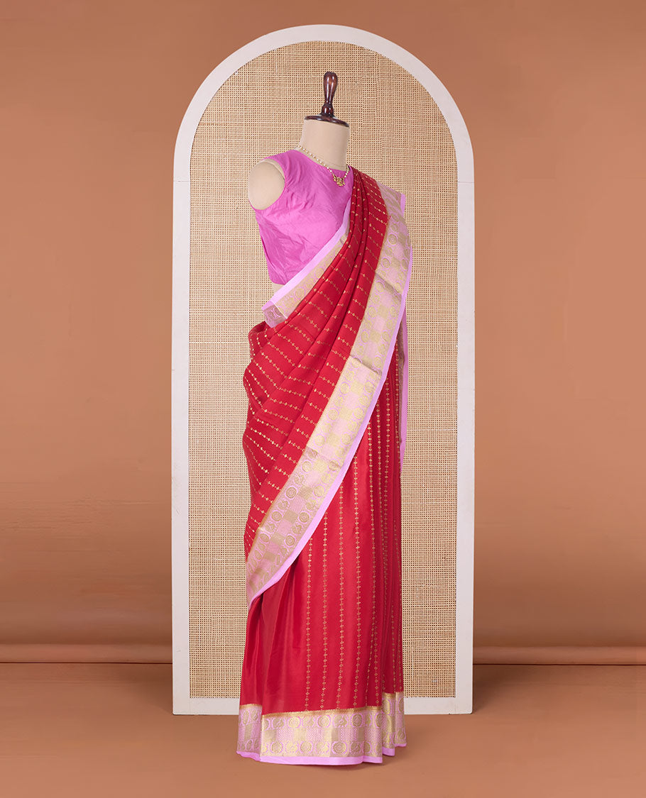 Red zari buttas Mysore silk saree, contrast peacock chakra motifs border, and traditional zari design pallu