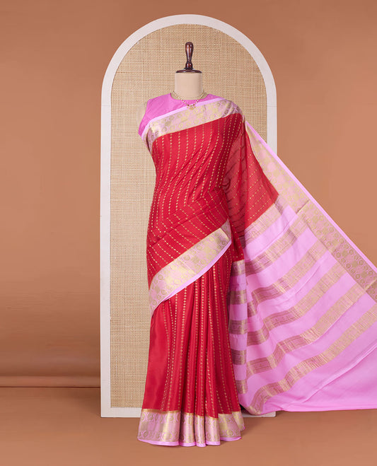 Red zari buttas Mysore silk saree, contrast peacock chakra motifs border, and traditional zari design pallu