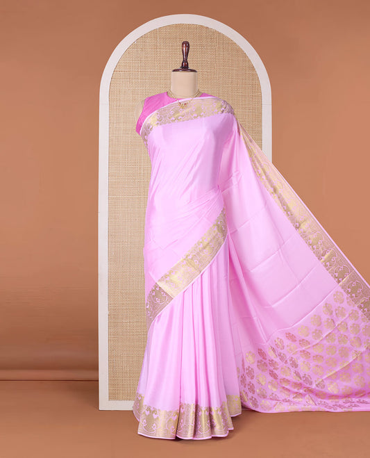 Pink plain Mysore silk saree, two-headed eagle zari border, and pallu steeped with two-headed eagle motifs