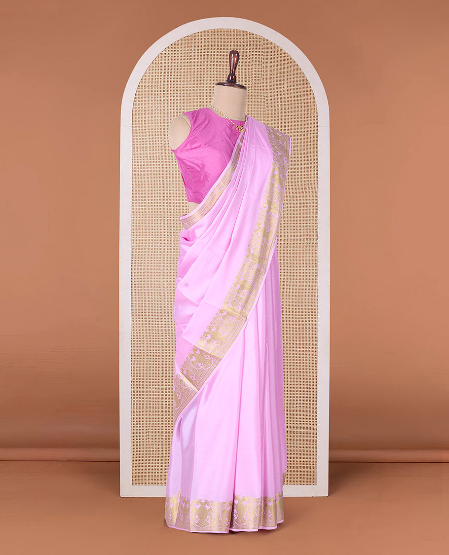 Pink plain Mysore silk saree, two-headed eagle zari border, and pallu steeped with two-headed eagle motifs