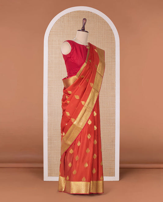 Orange zari buttas Mysore silk saree, traditional zari border, and ogee patterned pallu