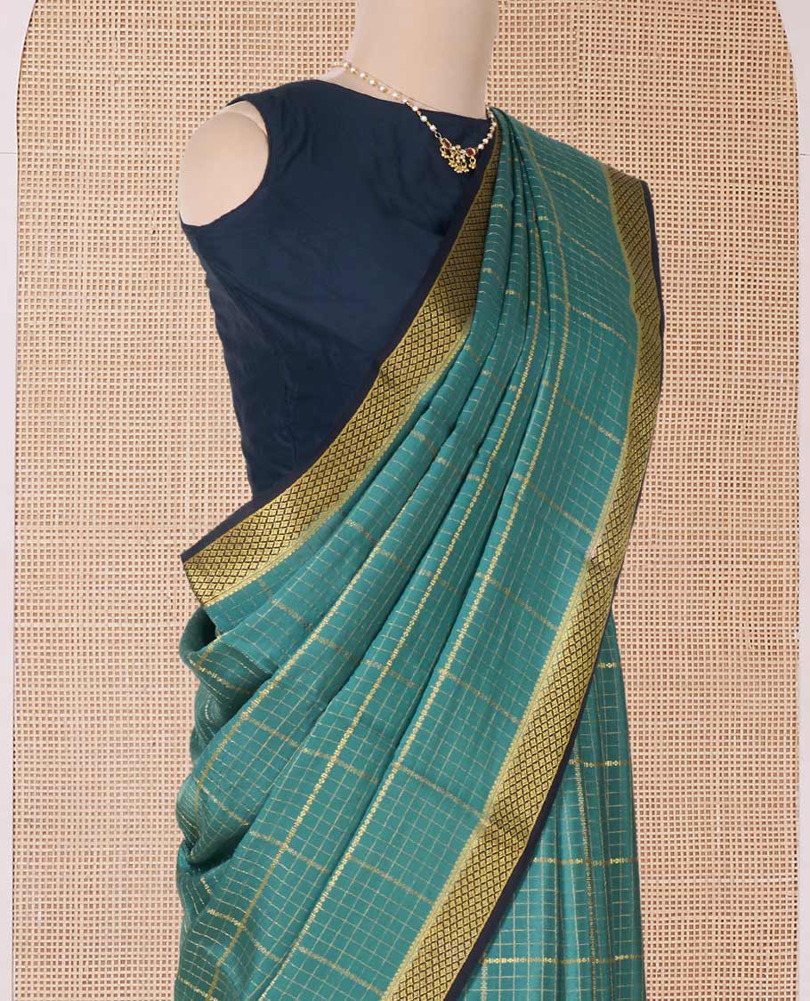 Green zari checked Mysore silk saree, contrast peacock eye border, and zari striped pallu