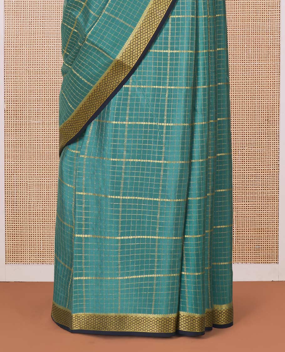 Green zari checked Mysore silk saree, contrast peacock eye border, and zari striped pallu