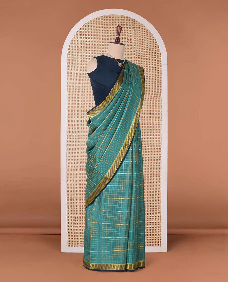 Green zari checked Mysore silk saree, contrast peacock eye border, and zari striped pallu