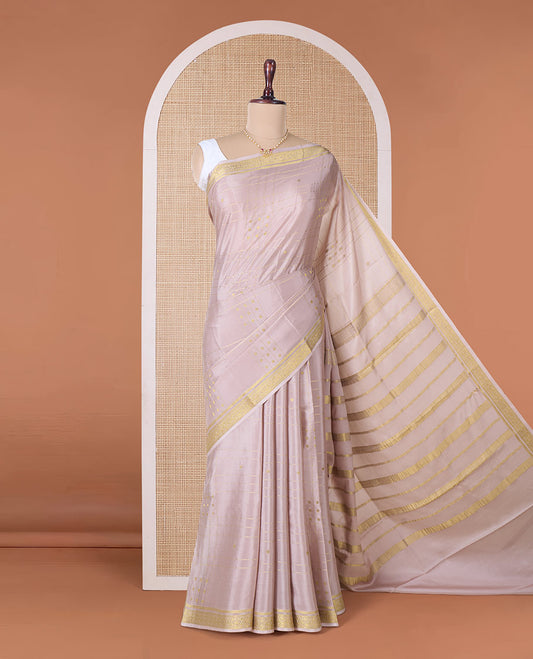 Beige zari buttas and checked Mysore silk saree, traditional zari border, and zari striped pallu