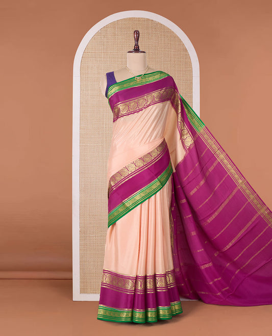 Peach plain Mysore silk saree, contrast rettai pettu traditional zari border, and zari striped pallu