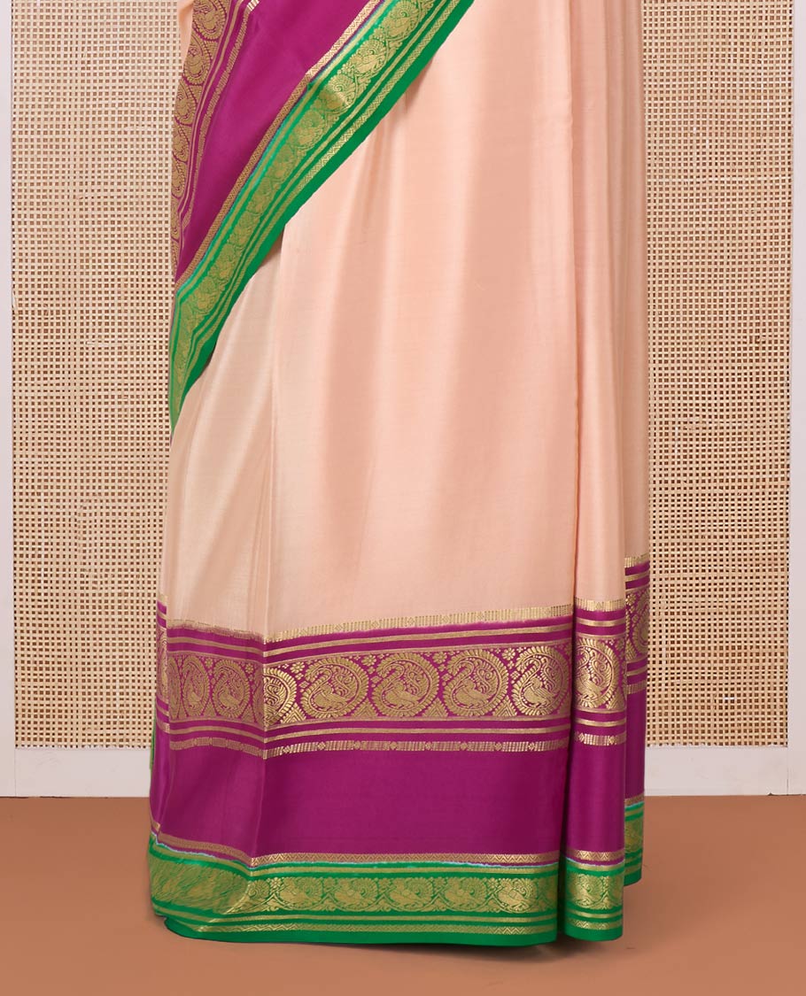 Peach plain Mysore silk saree, contrast rettai pettu traditional zari border, and zari striped pallu