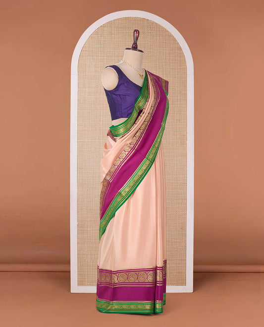 Peach plain Mysore silk saree, contrast rettai pettu traditional zari border, and zari striped pallu