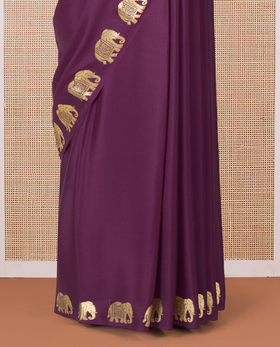 Purple plain Mysore silk saree with elephant motifs zari border, and pallu of miniatures of elephant motifs