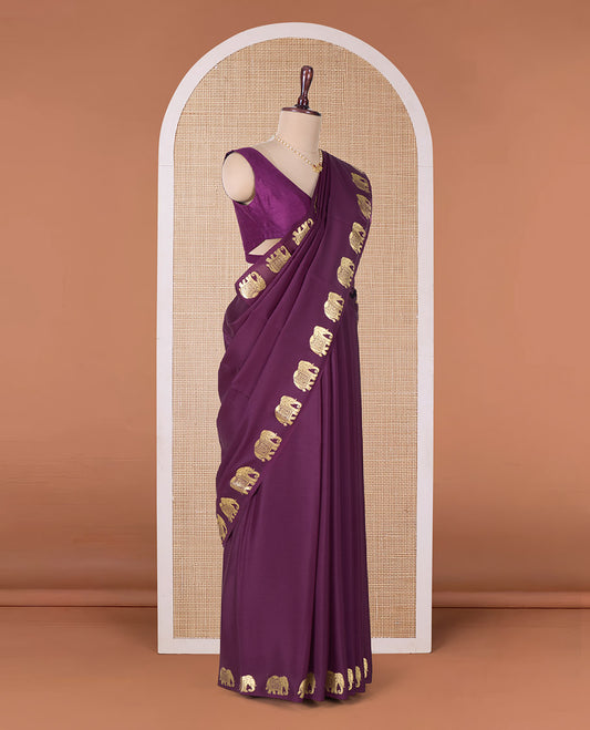 Purple plain Mysore silk saree with elephant motifs zari border, and pallu of miniatures of elephant motifs