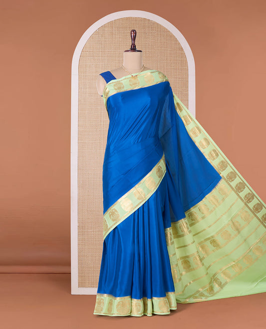 Blue plain Mysore silk saree, contrast two-headed eagle motifs zari woven border, and intricate pallu