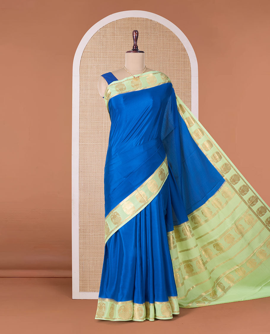 Blue plain Mysore silk saree, contrast two-headed eagle motifs zari woven border, and intricate pallu