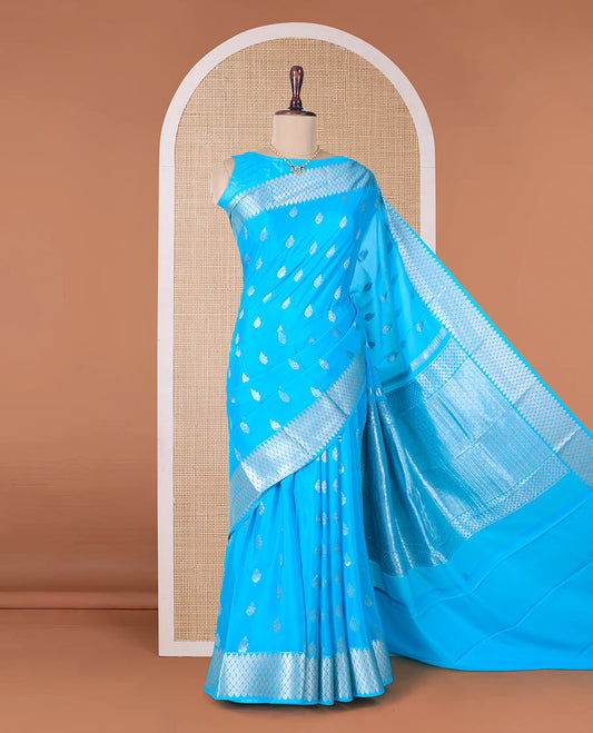 Blue zari buttas Mysore silk saree, peacock eye border, and pallu of jaal design