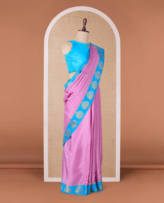 Pink plain Mysore silk saree, contrast paisley motifs border, and striped pallu