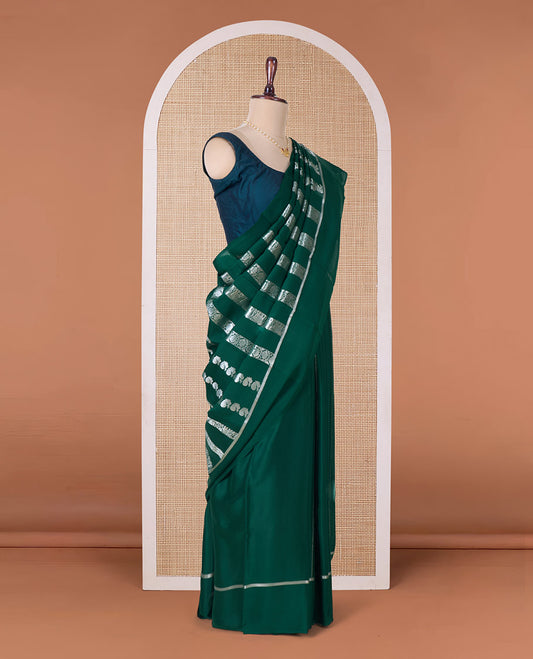 Green peacock, elephant, and floral creeper striped Mysore silk saree, self-border, and pallu of kanchipuram inspired flora-fauna designs