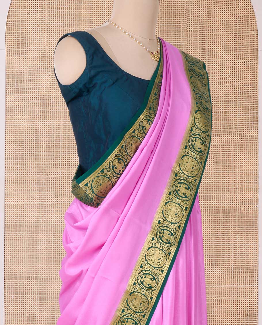 Pink plain Mysore silk saree, contrast border of two-headed eagle, and yaali designs, and zari striped pallu