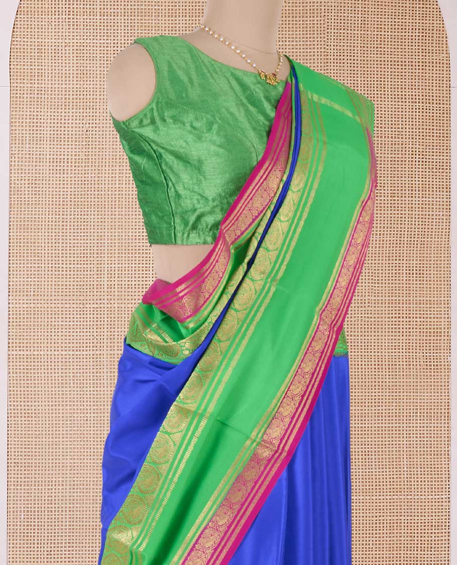 Blue plain Mysore silk saree, contrast traditional zari rettai pettu border, and zari striped pallu