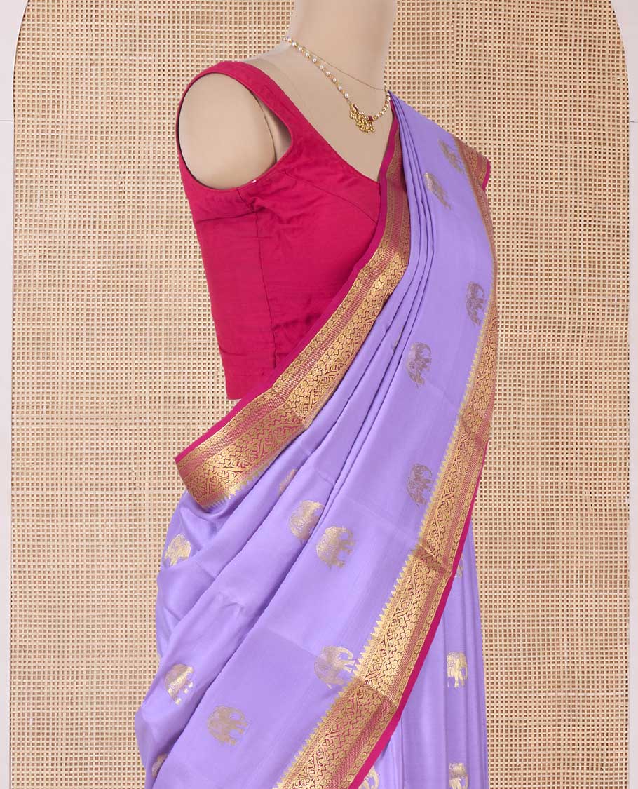 Lavender elephant motifs woven Mysore silk saree, contrast traditional zari border, and pallu of big paisley designs