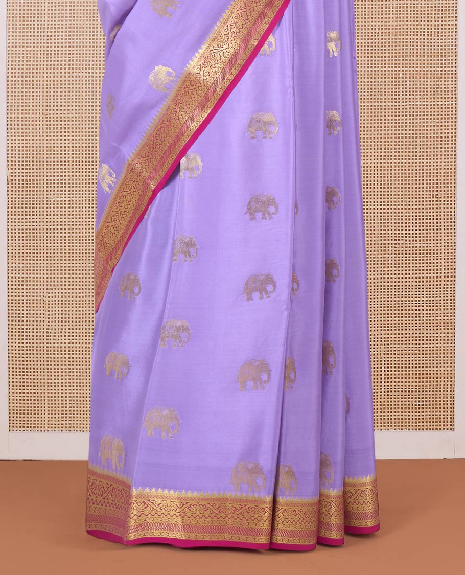 Lavender elephant motifs woven Mysore silk saree, contrast traditional zari border, and pallu of big paisley designs