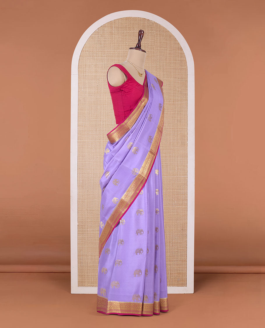 Lavender elephant motifs woven Mysore silk saree, contrast traditional zari border, and pallu of big paisley designs