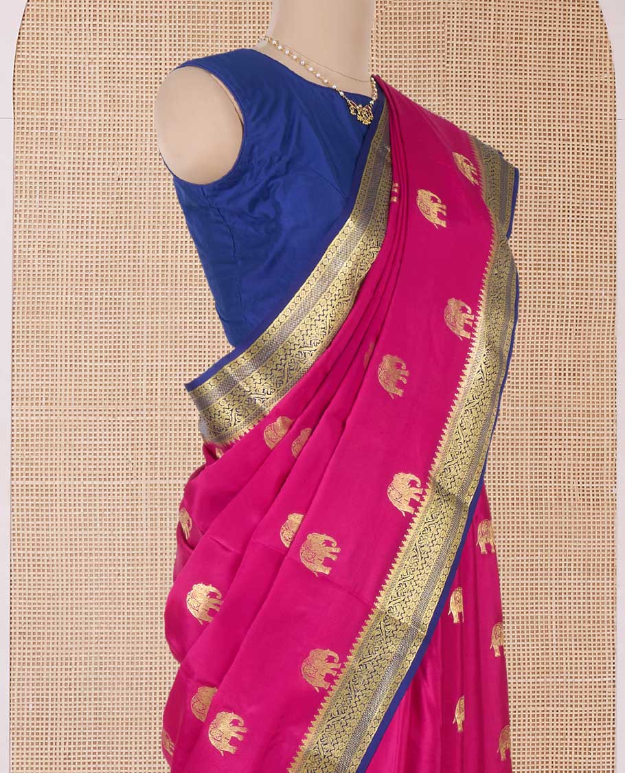 Pink elephant motifs woven Mysore silk saree, contrast traditional zari border, and pallu of big paisley designs