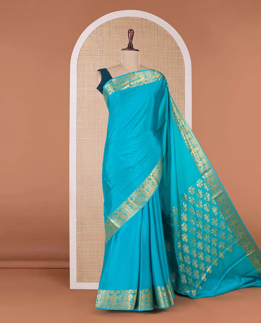 Blue plain Mysore silk saree, two-headed eagle motifs zari border, and pallu