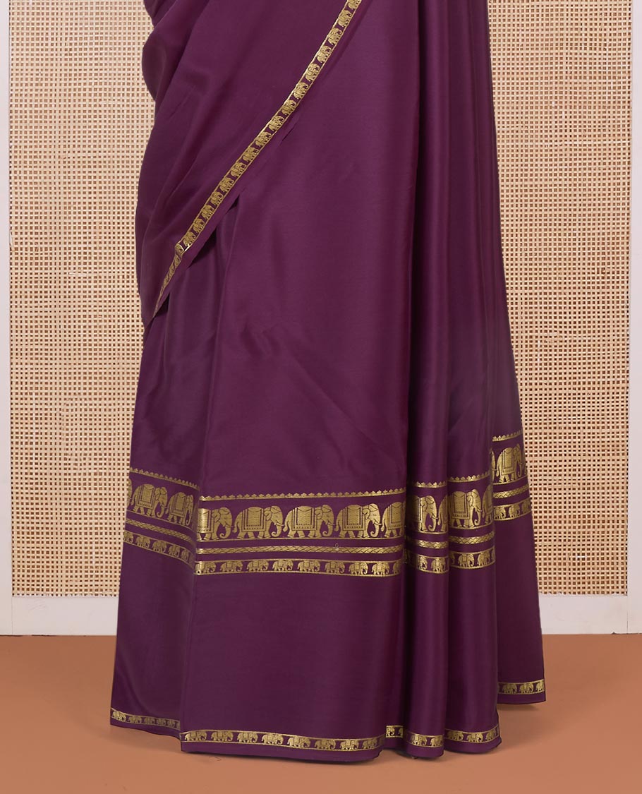 Purple plain Mysore silk saree, traditional zari border, and pallu of zari designs