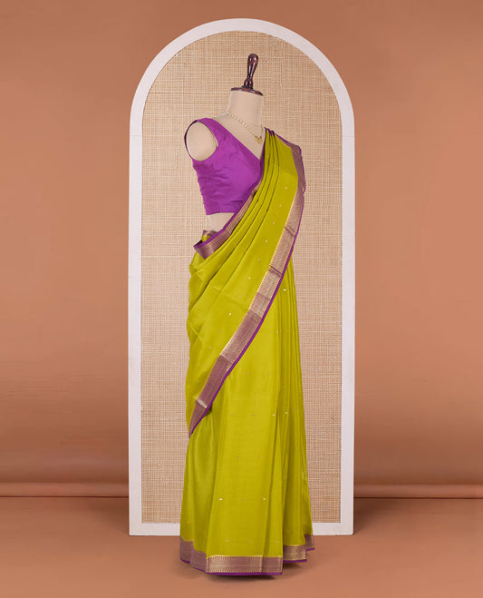 Green zari buttas Mysore silk saree, contrast traditional zari border, and zari design pallu