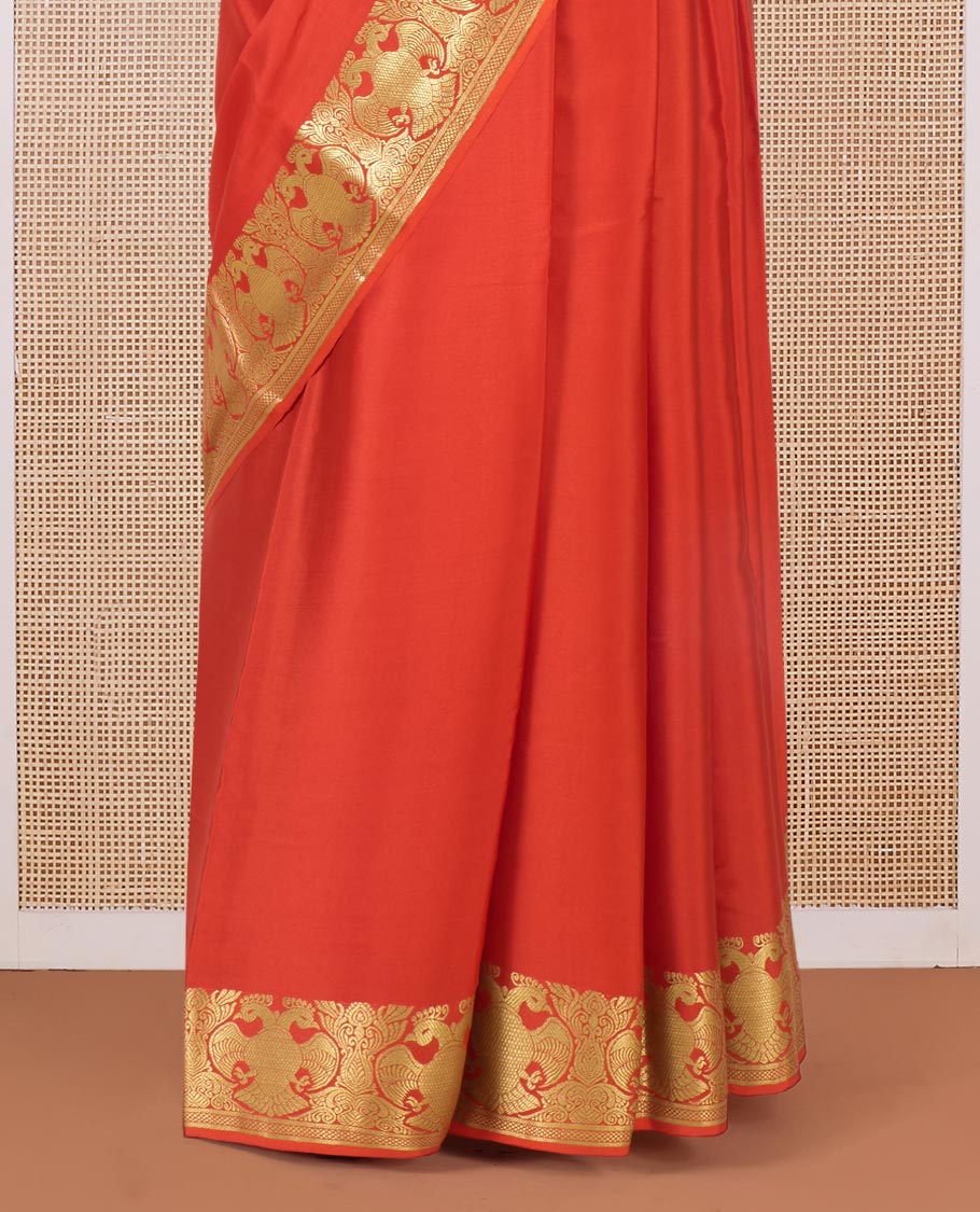 Orange plain Mysore silk saree, two-headed eagle motifs zari border, and pallu