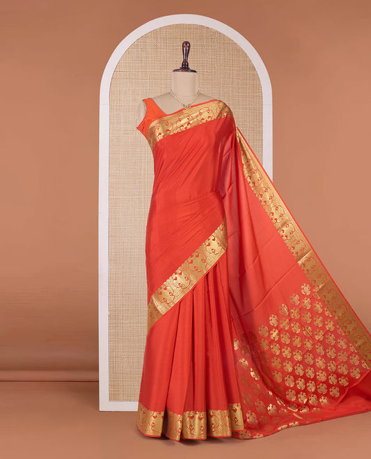 Orange plain Mysore silk saree, two-headed eagle motifs zari border, and pallu