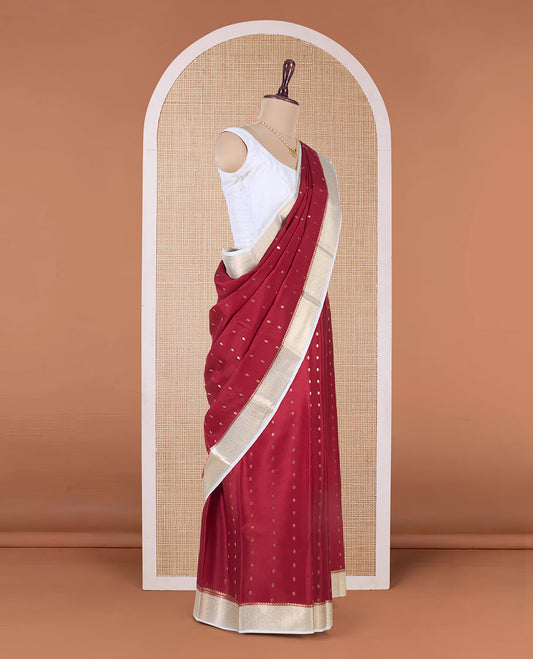Rust zari buttas Mysore silk saree, contrast traditional zari border, and zari rich jaal pallu