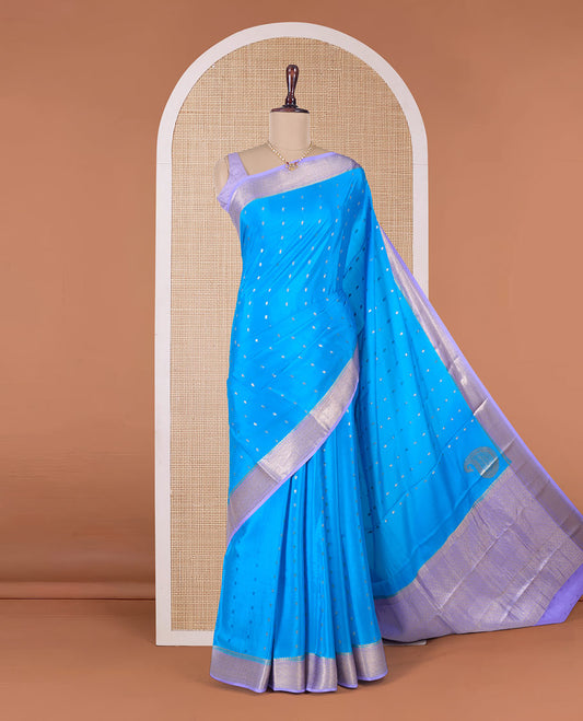 Blue zari buttas Mysore silk saree, contrast traditional zari border, and zari rich jaal pallu