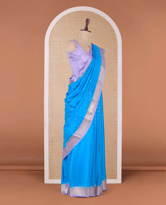Blue zari buttas Mysore silk saree, contrast traditional zari border, and zari rich jaal pallu