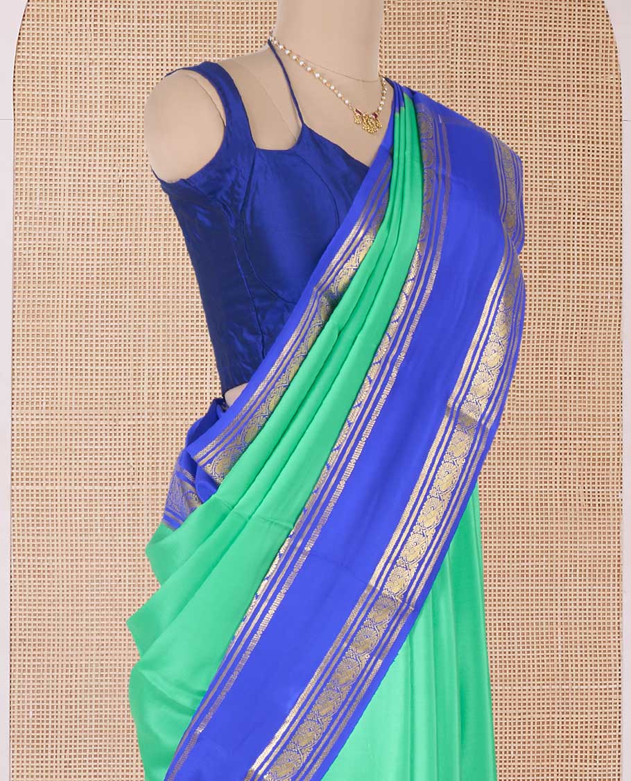 Green plain design Mysore silk saree, contrast rettai pettu traditional zari border, and zari striped pallu