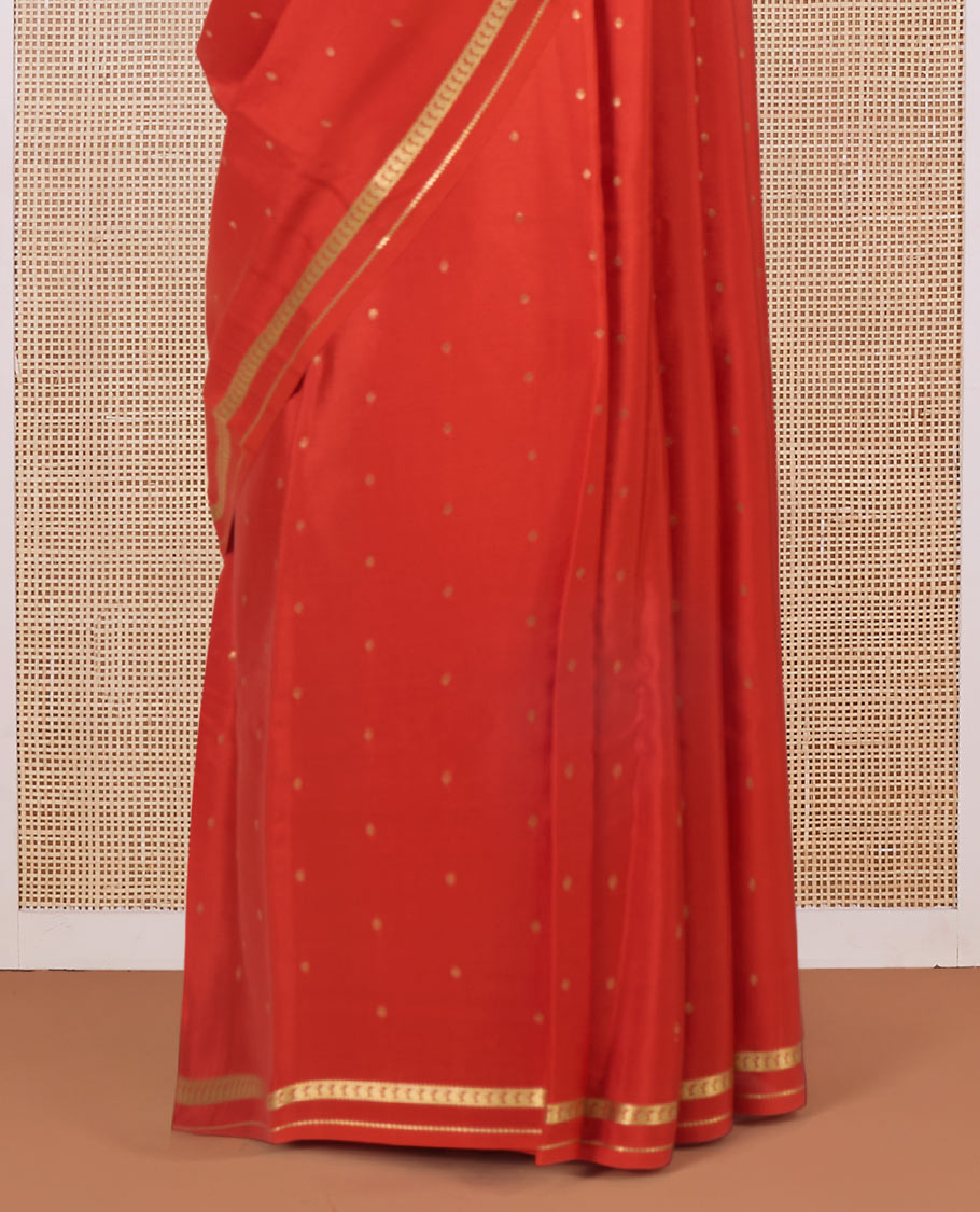 Orange zari buttas Mysore silk saree, paisley motifs border, and pallu of zari stripes