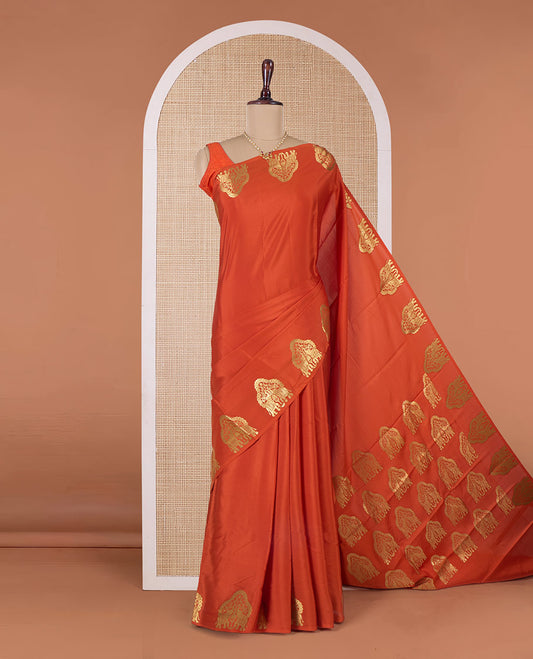 Orange plain Mysore silk saree, elephant motifs border, and pallu steeped with elephant motifs in zari