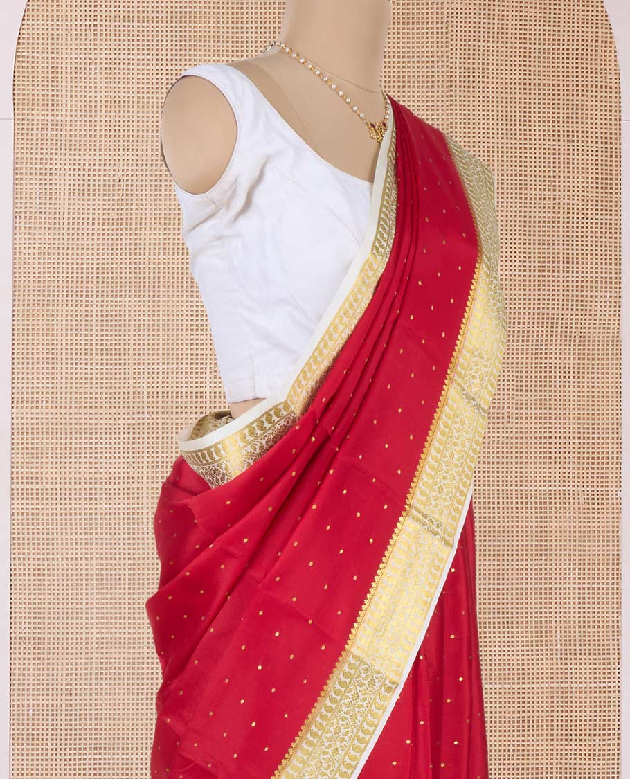 Red zari buttas Mysore silk saree, contrast traditional zari border, and zari-rich jaal pallu