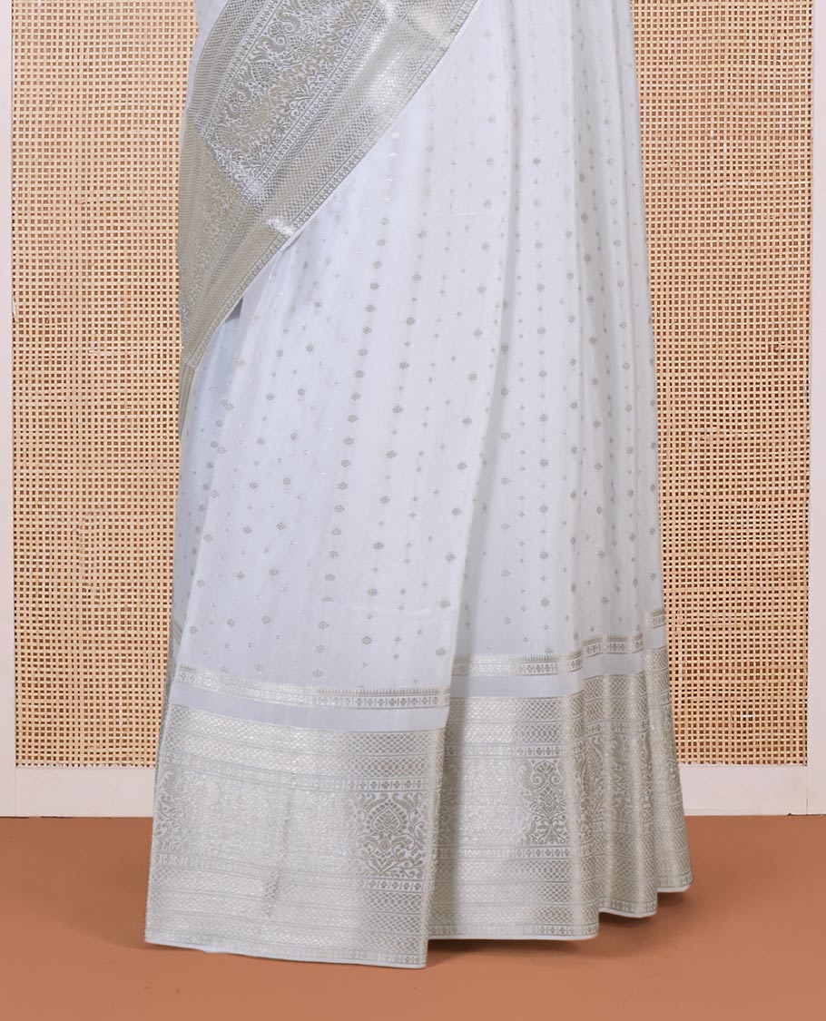 White zari buttas Mysore silk saree, traditional zari border, and intricate pallu