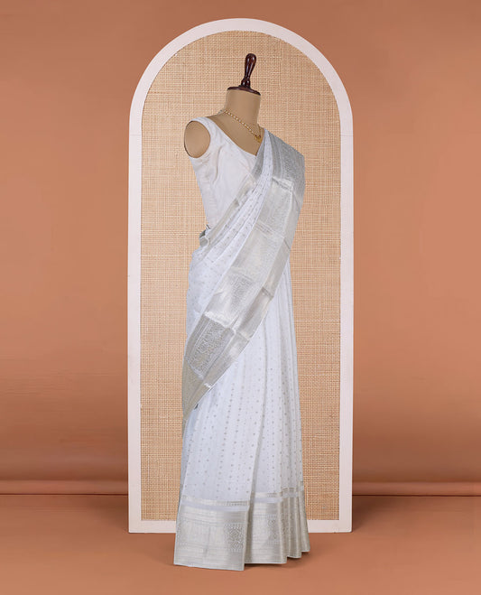White zari buttas Mysore silk saree, traditional zari border, and intricate pallu
